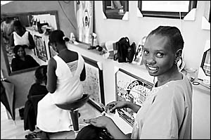 Keui works part time at Hairemovers in Park Street doing hair braiding and extensions and attends English classes two days a we Keui works part time at Hairemovers in Park Street doing hair braiding and extensions and attends English classes two days a we