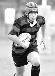 GAME ON: Stephen Coombe takes the ball forward. GAME ON: Stephen Coombe takes the ball forward.
