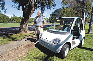 Doug Winn with the ultra-modern electric golf buggy he has been refused provisional registration for. He says the increasing nu Doug Winn with the ultra-modern electric golf buggy he has been refused provisional registration for. He says the increasing nu