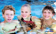 With Shane Kingston are surf lifesavers (from front) Sam Bell, Miranda Bell and Joel Russell. With Shane Kingston are surf lifesavers (from front) Sam Bell, Miranda Bell and Joel Russell.