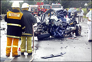 THE mangled wreckage of a 4WD in which two Mt St Patrick College students died on their way to school yesterday morning. THE mangled wreckage of a 4WD in which two Mt St Patrick College students died on their way to school yesterday morning.