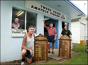 OUT the front door and into temporary storage. Tweed Heads Amateur Fishing Club members (from left) Mick Quinn, with his dog Ad OUT the front door and into temporary storage. Tweed Heads Amateur Fishing Club members (from left) Mick Quinn, with his dog Ad