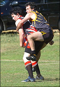 A tigerish Warren Bagnall puts everything into his efforts to stop a Sawtell attack. A tigerish Warren Bagnall puts everything into his efforts to stop a Sawtell attack.