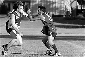 Trent Baade is pursued by Richard Booth on Saturday. Trent Baade is pursued by Richard Booth on Saturday.