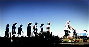 WALK ALONG: Shane Perry leads the band of Bi-Lo Yamba workers on the 2006 Trolley Challenge. The Yamba to Grafton leg of the tr WALK ALONG: Shane Perry leads the band of Bi-Lo Yamba workers on the 2006 Trolley Challenge. The Yamba to Grafton leg of the tr