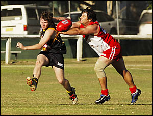 Grafton Tigers defender Bryce Kurtzman clears the defensive 50m line during Saturday?s game against the South Coffs Swans. Phot Grafton Tigers defender Bryce Kurtzman clears the defensive 50m line during Saturday?s game against the South Coffs Swans. Phot