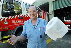 A LONG WAIT: Volunteer Burringbar firefighter and local mechanic Lex Philip at the fire shed with no loo. Photo: CRAIG SADLER A LONG WAIT: Volunteer Burringbar firefighter and local mechanic Lex Philip at the fire shed with no loo. Photo: CRAIG SADLER
