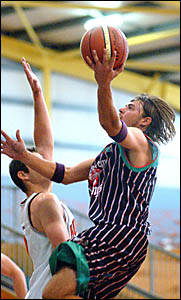 Glenn Boorman drives to the basket. Glenn Boorman drives to the basket.
