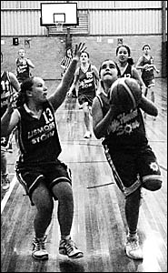 Penny Prior, left, from Lismore defending against Coffs Harbour?s Tiarne Saunders during the under-14 girls match. Penny Prior, left, from Lismore defending against Coffs Harbour?s Tiarne Saunders during the under-14 girls match.