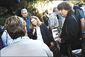 Angry residents gather outside Coffs Harbour City Council Chambers on Thursday night. Angry residents gather outside Coffs Harbour City Council Chambers on Thursday night.