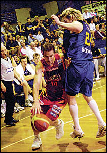 Melbourne Tigers guard Matt O?Hea drives past Brisbane?s Dillon Boucher in Saturday?s night?s final of the Virgin Blue NBL Blit Melbourne Tigers guard Matt O?Hea drives past Brisbane?s Dillon Boucher in Saturday?s night?s final of the Virgin Blue NBL Blit