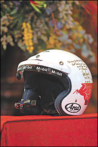 The helmet of Australian race car driver Peter Brock rests on a stand during his State funeral at St Paul?s Cathedral in Melbou The helmet of Australian race car driver Peter Brock rests on a stand during his State funeral at St Paul?s Cathedral in Melbou