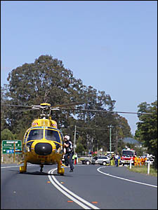 The Westpac rescue helicopter lands on the Pacific Highway to pick up an unconscious Coffs Harbour man following a car crash at The Westpac rescue helicopter lands on the Pacific Highway to pick up an unconscious Coffs Harbour man following a car crash at