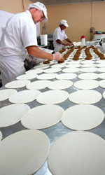 Dad's Pies at Goodna turns out 10,000 pies a day and all 40 staff members are from the Ipswich region. Dad's Pies at Goodna turns out 10,000 pies a day and all 40 staff members are from the Ipswich region.