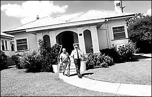 Crime prevention officer Senior Constable Michael Hogan (left) and Superintendent Bruce Lyons conduct a doorknock during investigations into the 2000 death of Lismore man Peter Allen. Crime prevention officer Senior Constable Michael Hogan (left) and Superintendent Bruce Lyons conduct a doorknock during investigations into the 2000 death of Lismore man Peter Allen.