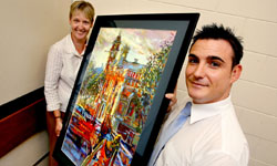 QT editor Natalie Gauld and general manager Steve Hutton with last year's art award acquisition. QT editor Natalie Gauld and general manager Steve Hutton with last year's art award acquisition.