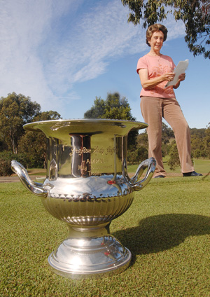 THE SILVERWARE: President of Grafton Lady Golfers Elaine Taubman looks over the start list for this year?s annual May Tournamen THE SILVERWARE: President of Grafton Lady Golfers Elaine Taubman looks over the start list for this year?s annual May Tournamen