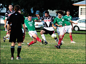 ACTION: Rovers? Rob McGregor (centre) gets attention from Stars? Jamie Austen (left) and Bill Latimer ACTION: Rovers? Rob McGregor (centre) gets attention from Stars? Jamie Austen (left) and Bill Latimer