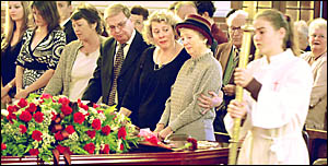 FAMILY COMFORT: From left grand-daughters Melinda Bartlett, of Gladstone, and Marilyn Hoschke, from Darwin, Mary Bartlett (daug FAMILY COMFORT: From left grand-daughters Melinda Bartlett, of Gladstone, and Marilyn Hoschke, from Darwin, Mary Bartlett (daug