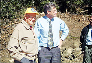 COMMUNITY STALWART: Kyogle Lions Club member and long-time Lions Road campaigner Jack Hurley, and RTA regional manager Peter Co COMMUNITY STALWART: Kyogle Lions Club member and long-time Lions Road campaigner Jack Hurley, and RTA regional manager Peter Co