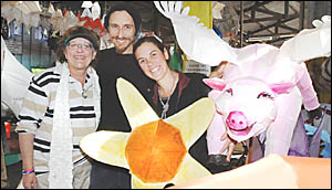 FIRED UP: Lantern Parade workers (from left) Karen Coyle, Jon-o Beresford and Kate McDonald make last-minute preparations. FIRED UP: Lantern Parade workers (from left) Karen Coyle, Jon-o Beresford and Kate McDonald make last-minute preparations.