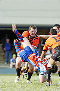 GROUNDED: Marc Cox of Kyogle is tackled by Rob Loring of South Tweed in the Retravision Northern League match at Kyogle last Su GROUNDED: Marc Cox of Kyogle is tackled by Rob Loring of South Tweed in the Retravision Northern League match at Kyogle last Su