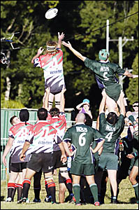 HIGH AND MIGHTY: Chris Woodley (Coolangatta-Tweed) and Glen Paisley (Lismore) contest possession in a line-out in the game at L HIGH AND MIGHTY: Chris Woodley (Coolangatta-Tweed) and Glen Paisley (Lismore) contest possession in a line-out in the game at L