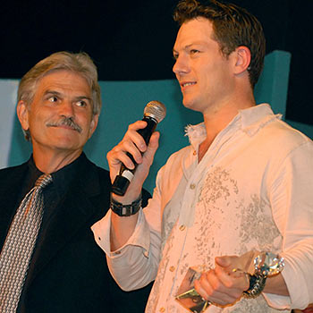 Az Jackson receiving one of his three awards, with Bob Anderson, CEO of UjENA. Az Jackson receiving one of his three awards, with Bob Anderson, CEO of UjENA.