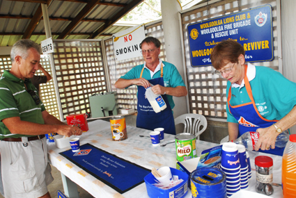 Reviving ... volunteers Janette and Peter Hawke serve traveller Michael Long a coffee at the Woolgoolga Driver Reviver. Reviving ... volunteers Janette and Peter Hawke serve traveller Michael Long a coffee at the Woolgoolga Driver Reviver.