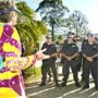 Noah Yamore, of Mullumbimby, supposedly sings to police before the start of the MardiGrass law reform parade in Nimbin. Noah Yamore, of Mullumbimby, supposedly sings to police before the start of the MardiGrass law reform parade in Nimbin.