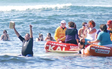 Neil Edmonds, father of Peter, raises both arms skywards after scattering his sons ashes in the ocean off Lennox Head. Peter, 16, of Wollongbar, died after being attacked at North Wall, Ballina, on April 8. Neil Edmonds, father of Peter, raises both arms skywards after scattering his sons ashes in the ocean off Lennox Head. Peter, 16, of Wollongbar, died after being attacked at North Wall, Ballina, on April 8.