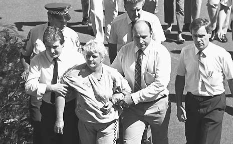Valmae Fay Beck is escorted by police after the murder of 12 year old schoolgirl Sian Kingi. Valmae Fay Beck is escorted by police after the murder of 12 year old schoolgirl Sian Kingi.