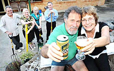 Winners of the $10,000 Front Yard Fix, Suzanne and Phillip McCarthy (front) amid the rubble in the front yard of their Barham Street home. Winners of the $10,000 Front Yard Fix, Suzanne and Phillip McCarthy (front) amid the rubble in the front yard of their Barham Street home.