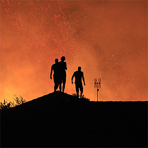 Taking photos of a fire, or any disaster for that matter, isn't in anyone's best interests Taking photos of a fire, or any disaster for that matter, isn't in anyone's best interests