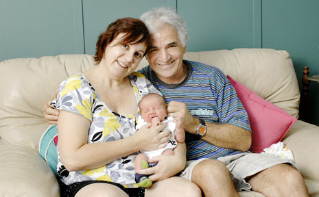 Fiona and Paul Lister with baby Izaak, whose birth came as a near miracle to the proud parents. Fiona and Paul Lister with baby Izaak, whose birth came as a near miracle to the proud parents.