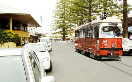 An artist’s impression of a tram running on tracks at the top end of Jonson Street, outside the Beach Hotel. An artist’s impression of a tram running on tracks at the top end of Jonson Street, outside the Beach Hotel.