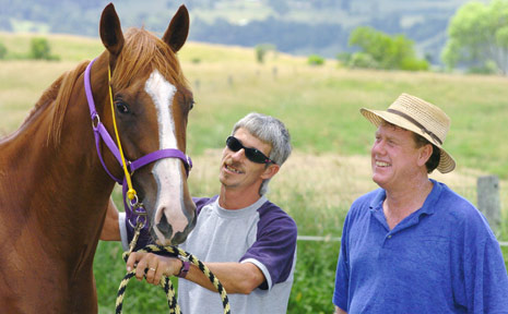Owner Kevin Cocciola, far right, and trainer Owen Glue with Capilano Road. Owner Kevin Cocciola, far right, and trainer Owen Glue with Capilano Road.