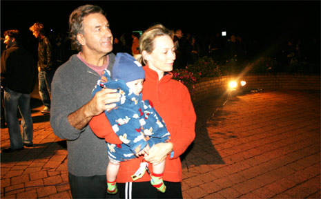 Quiet reflection for Byron Bay’s Dave, Kirsten and son Timmy Chibeba at the Byron Bay Dawn Service. Quiet reflection for Byron Bay’s Dave, Kirsten and son Timmy Chibeba at the Byron Bay Dawn Service.