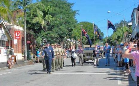 The parade makes its way down Bangalow’s main street. The parade makes its way down Bangalow’s main street.