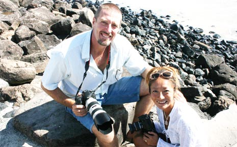 Pointing out the Byron Bay positives. Ben and Yoko Bennink on the job at Main Beach. Pointing out the Byron Bay positives. Ben and Yoko Bennink on the job at Main Beach.