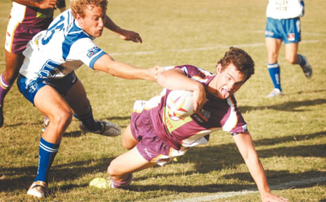 TRY TIME: Rhinos halfback Todd Cameron crosses to score in yesterday's Grafton rugby league derby at McKittrick Park, despite the attention of Ghosts rival Josh Donohoe. Cameron's four-pointer gave the Rhinos an early lead, but the Ghosts finished the stronger to run out 33-20 winners in an exciting encounter. TRY TIME: Rhinos halfback Todd Cameron crosses to score in yesterday's Grafton rugby league derby at McKittrick Park, despite the attention of Ghosts rival Josh Donohoe. Cameron's four-pointer gave the Rhinos an early lead, but the Ghosts finished the stronger to run out 33-20 winners in an exciting encounter.