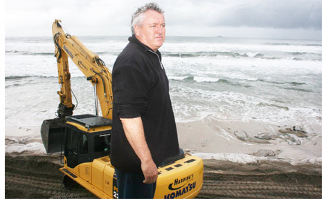 Belongil Beach home owner, John Vaughan, inspects progress of protection works on Monday. Belongil Beach home owner, John Vaughan, inspects progress of protection works on Monday.