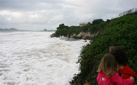 A surging sea threatens property at Belongil Beach during recent big seas. A surging sea threatens property at Belongil Beach during recent big seas.