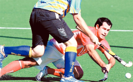 RYAN Phillips of the Waratahs goes down low for the ball during their final round clash of the JH Williams Hockey League against United. RYAN Phillips of the Waratahs goes down low for the ball during their final round clash of the JH Williams Hockey League against United.