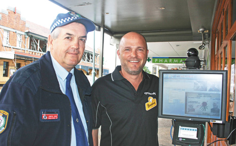 Cocomangas licensee Gary Charles (right) and Inspector Owen King inspect the new identification scanner outside Cocomangas Nightclub in Byron Bay. Cocomangas licensee Gary Charles (right) and Inspector Owen King inspect the new identification scanner outside Cocomangas Nightclub in Byron Bay.
