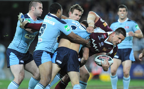 Queensland prop Steve Price is tackled during Queensland v New South Wales State of Origin Game 3 at Suncorp Stadium in Brisbane. Queensland prop Steve Price is tackled during Queensland v New South Wales State of Origin Game 3 at Suncorp Stadium in Brisbane.