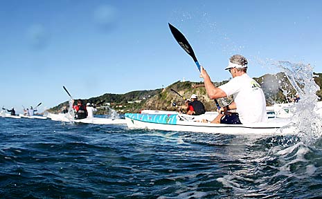 Byron Bay’s Glen Lawrence heads for the cape in Saturday’s ocean paddle. Byron Bay’s Glen Lawrence heads for the cape in Saturday’s ocean paddle.