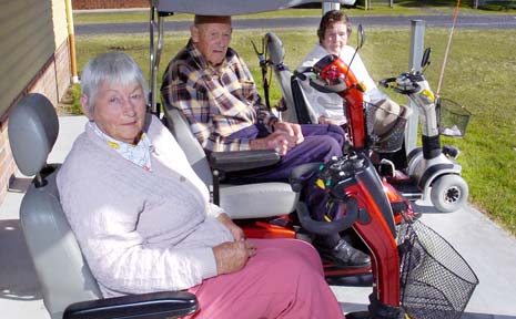 Ballina senior citizens (from left) Jean Buttemshaw, Cecil Gouling and Gay Topham now have a new covered parking area to protect their mobility scooters, thanks to council spending. Ballina senior citizens (from left) Jean Buttemshaw, Cecil Gouling and Gay Topham now have a new covered parking area to protect their mobility scooters, thanks to council spending.