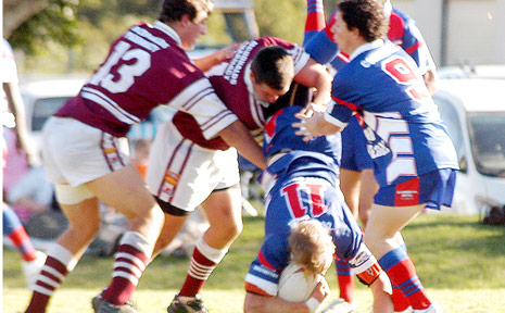 The Casino defence up-ends Kyogle’s Cameron Reid at New Park, Kyogle, on Saturday. The Casino defence up-ends Kyogle’s Cameron Reid at New Park, Kyogle, on Saturday.