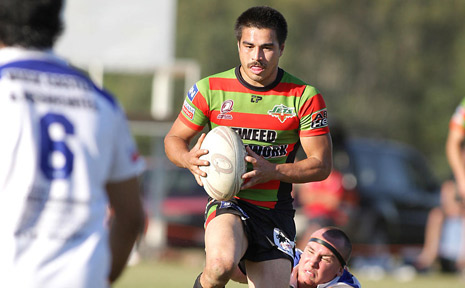 BILAMBIL Jets' James Marcus breaks the tackle of Tugun Seahawk Sam Rowling in the last round of the Gold Coast rugby league at Bilambil yesterday. A huge crowd was on hand to see the Jets win a thriller 41-38. BILAMBIL Jets' James Marcus breaks the tackle of Tugun Seahawk Sam Rowling in the last round of the Gold Coast rugby league at Bilambil yesterday. A huge crowd was on hand to see the Jets win a thriller 41-38.